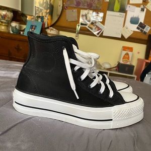 Orange bottomed mesh converse